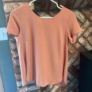 Pretty open back blouse. Blush colored. Sienna Sky size XS